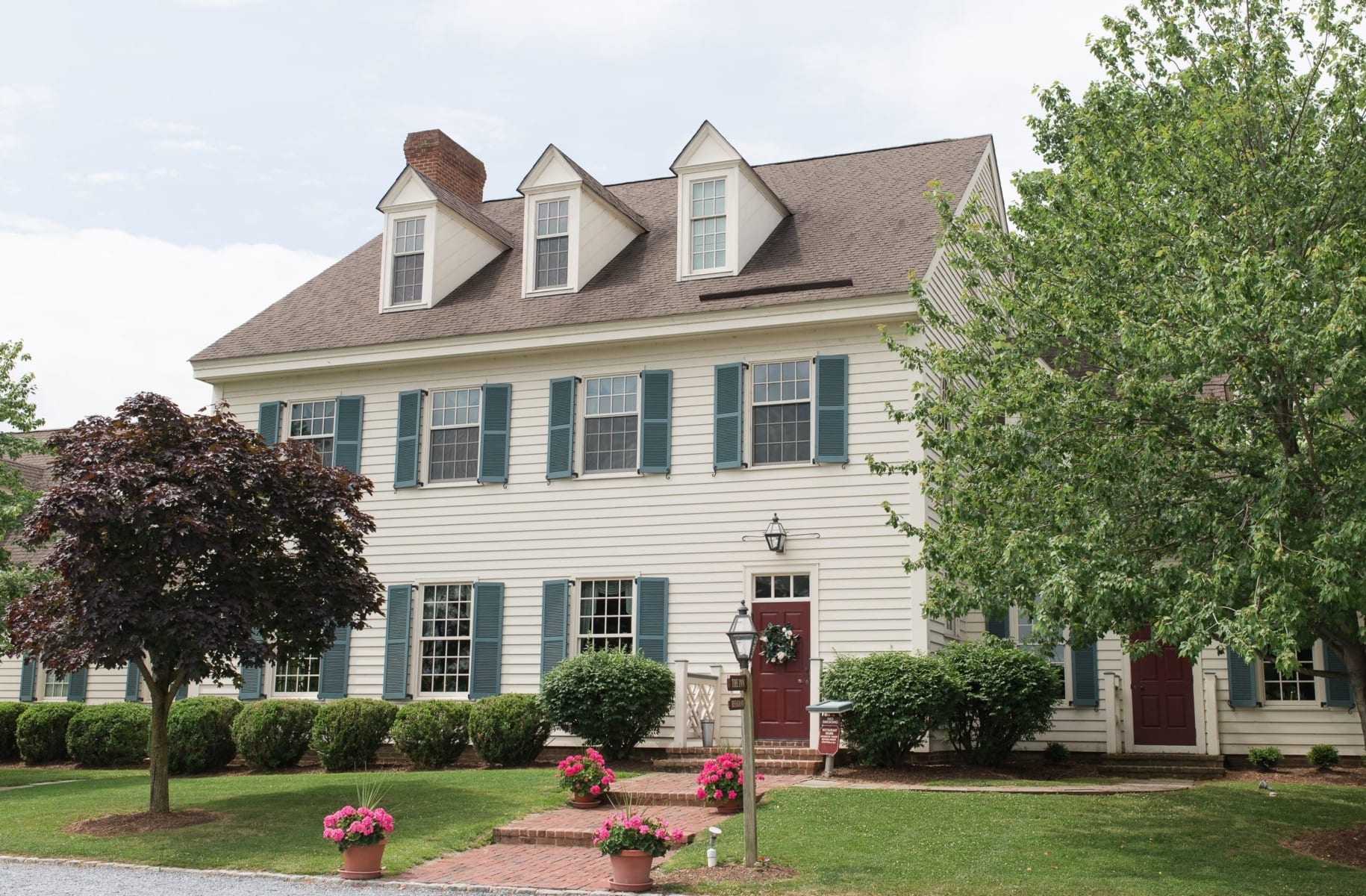 White colonial two story inn.