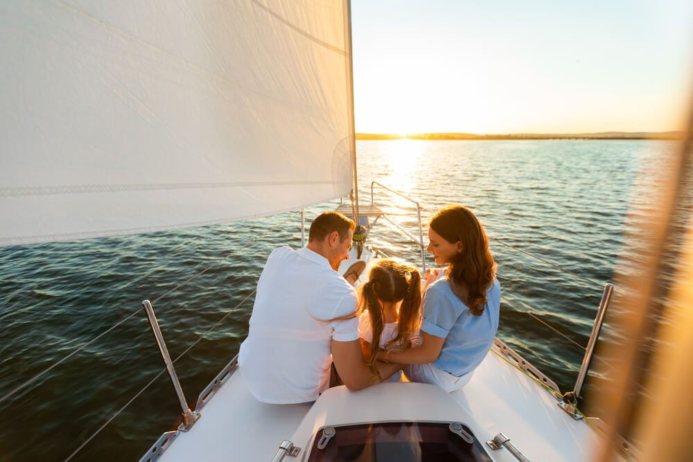 A family of three on a yacht in Rock Hall, MD
