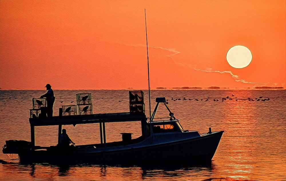 Maryland Watermen fishing on the Chesapeake at sunset